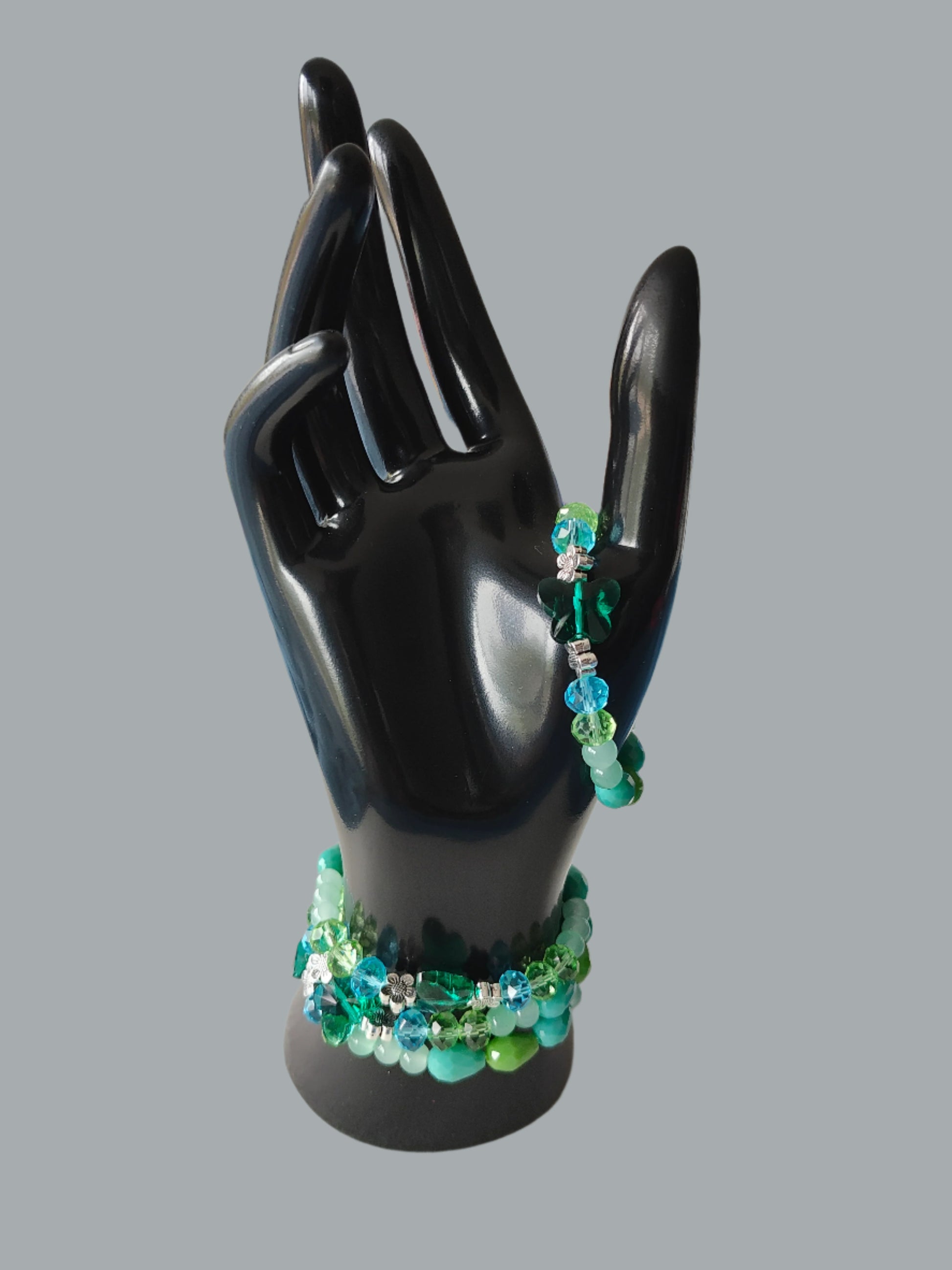 This playful bracelet features a sparkling crystal butterfly bead, elegant blue and green beads, and charming flower metal spacers. The lightweight design weighs just 0.40 oz, making it comfortable for all-day wear. Perfect for adding a touch of whimsy to any outfit.

Bracelet - Elastic Crystal butterfly bead with blue and green beads and flower metal spacer beads

Crystal butterfly bead and 8mm blue and green crystal bead, Glass 8mm blue and green tear drop bead, Glass 6 mm green beads, Metal flower spacer