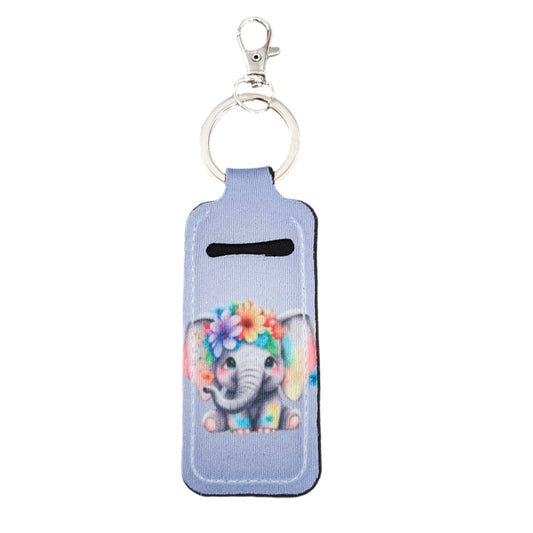 Keep your lipstick close at hand with our sublimated lipstick holder keychain featuring an adorable elephant design. No more digging through your bag to touch up your pout, this keychain keeps your lipstick easily accessible and adds a touch of cuteness to your everyday essentials.