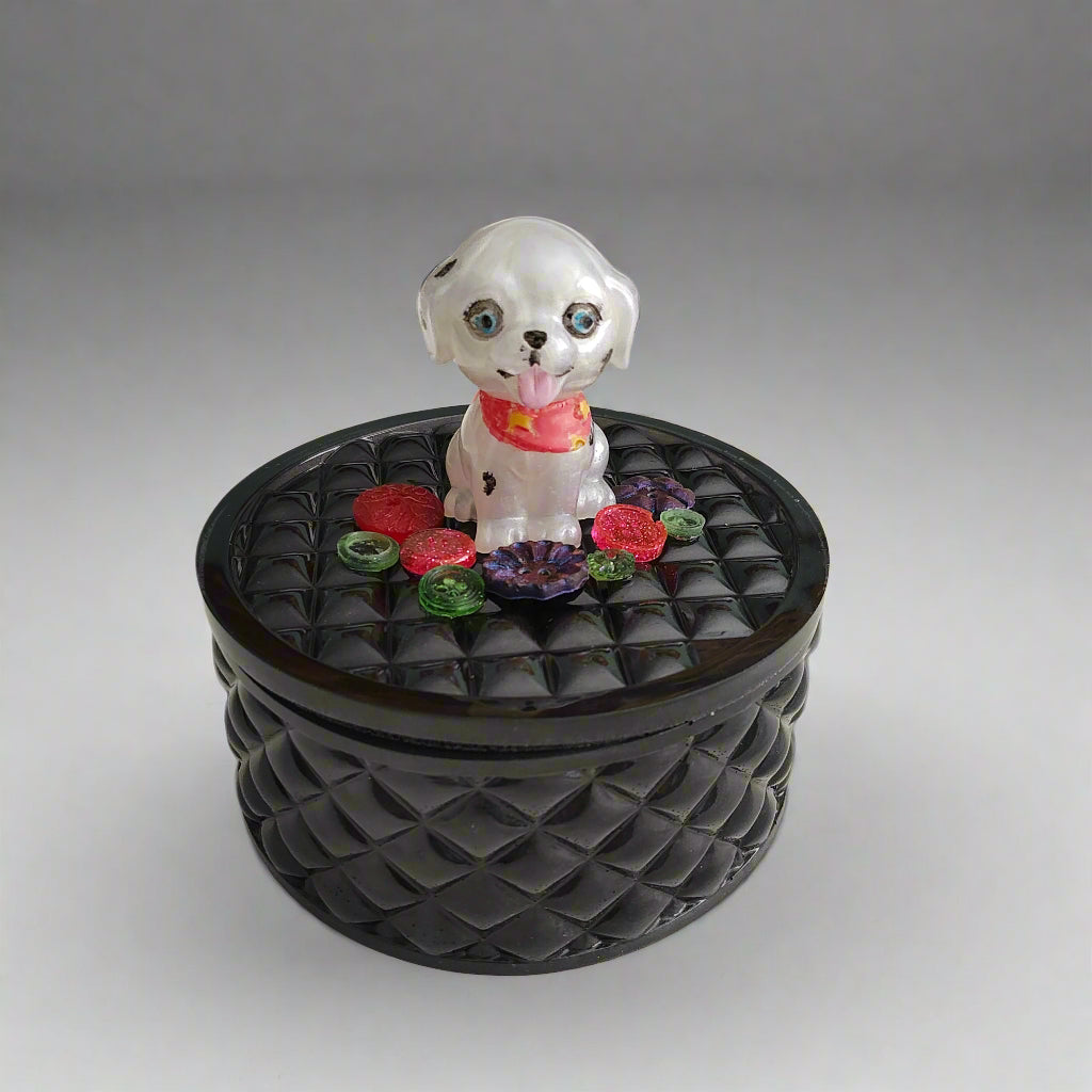 Keep your precious trinkets safe in this quirky Knickknack box! The resin round box features a playful dalmatian lid, adding a touch of fun to your storage. With a height of 5 inches and a dish depth of 2 inches, it's perfect for keeping your jewelry and small items organized. Weighing only 11 ounces, it's lightweight and easy to move around. 