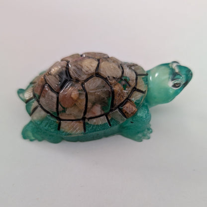 hand crafted with epoxy resin, and hand painted with acrylic paints.

Epoxy resin is typically smooth, rigid, and non-porous, similar to a hard plastic or glass.