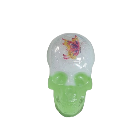 Add a unique touch to your home decor with our Knickknack - Resin small skull. Made with high-quality resin, this skull is a perfect blend of edginess and creativity. Elevate your space with this eye-catching piece that will surely spark your imagination.