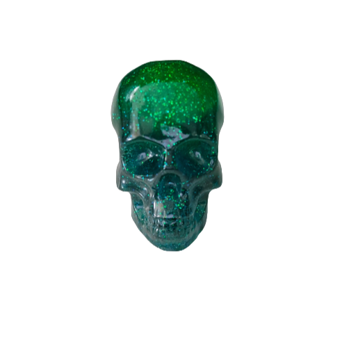 Add a unique touch to your home decor with our Knickknack - Resin small skull. Made with high-quality resin, this skull is a perfect blend of edginess and creativity. Elevate your space with this eye-catching piece that will surely spark your imagination.