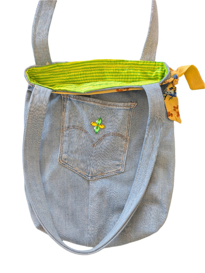 "Go green, look great. This bag delivers on both, with its clever combination of refurbished and new materials ensuring it's both earth-friendly and effortlessly stylish."