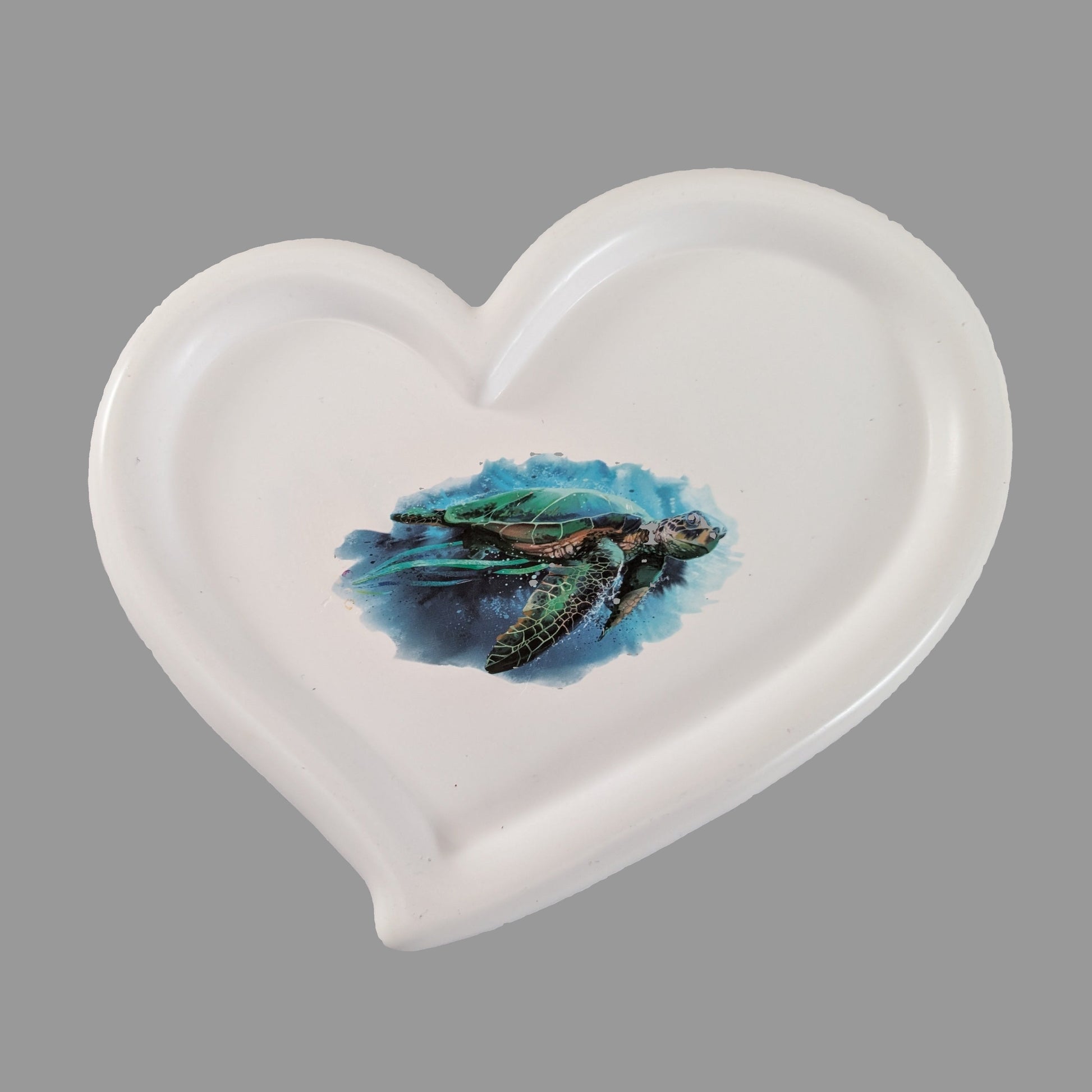 hand crafted with eco resin.

Eco Resin feels similar to Ceramic or porcelain: smooth, cool to the touch, and non-plastic.