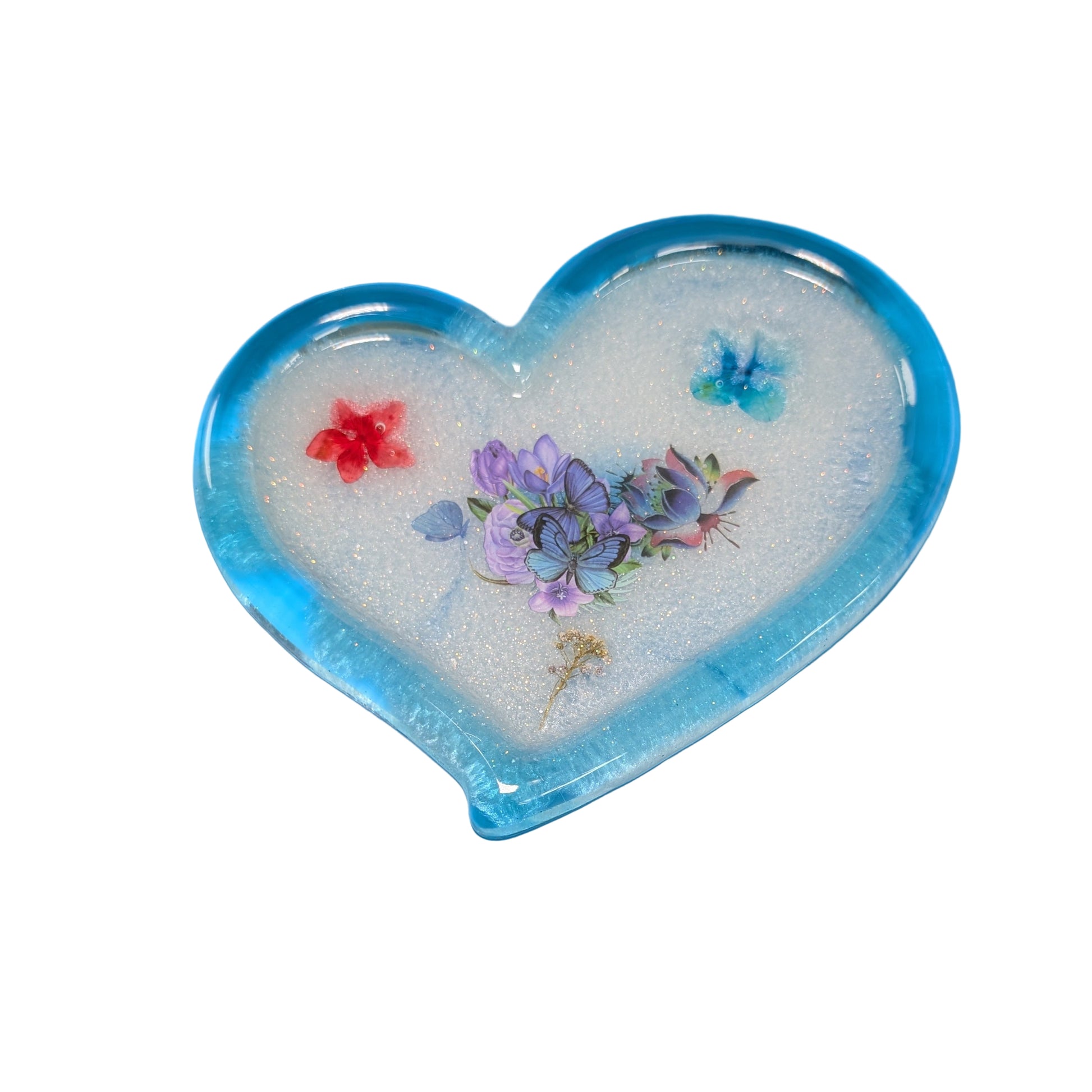 Elevate your decor with this Large irregular resin heart tray. Measuring approximately 7 by 6 inches and weighing just 6.8 ounces, this unique tray blends artistic irregularity with practical size. Perfect for organizing small items or adding a charming accent to any room, its resin finish ensures durability while enhancing its sleek, modern appeal.
