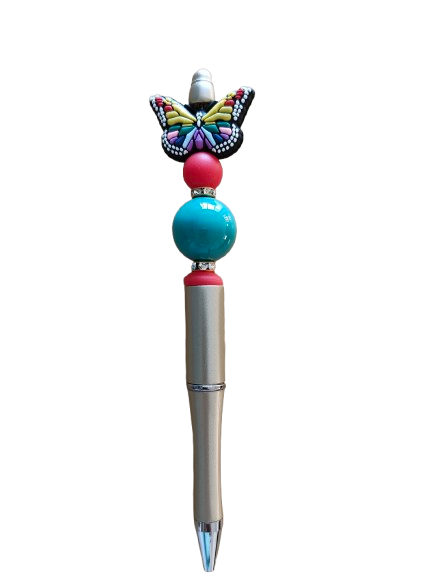 Unleash creativity with our Pen - Butterfly silicon beaded acrylic pen! Featuring sleek black ink, this pen is adorned with beautiful butterfly beads, perfect for adding a touch of whimsy to any writing task. Express yourself with every stroke!