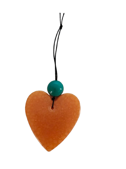 Feel the freshness of nature with Freshie's Heart With Bead air freshener! Enjoy the pleasing scent and unique design of this delightful product. Refresh your home and cars with this beautiful, eye-catching air freshener!