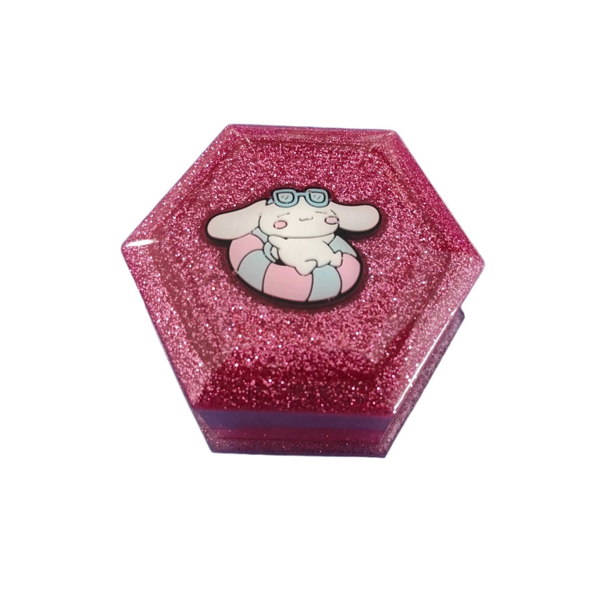 Add a touch of whimsy to your jewelry collection with our Knickknack Resin Hexagon Jewelry Box. The character lid adds a playful element to your storage, while the resin material ensures durability and protection for your precious pieces. Keep your jewelry safe and organized with this unique and charming box.