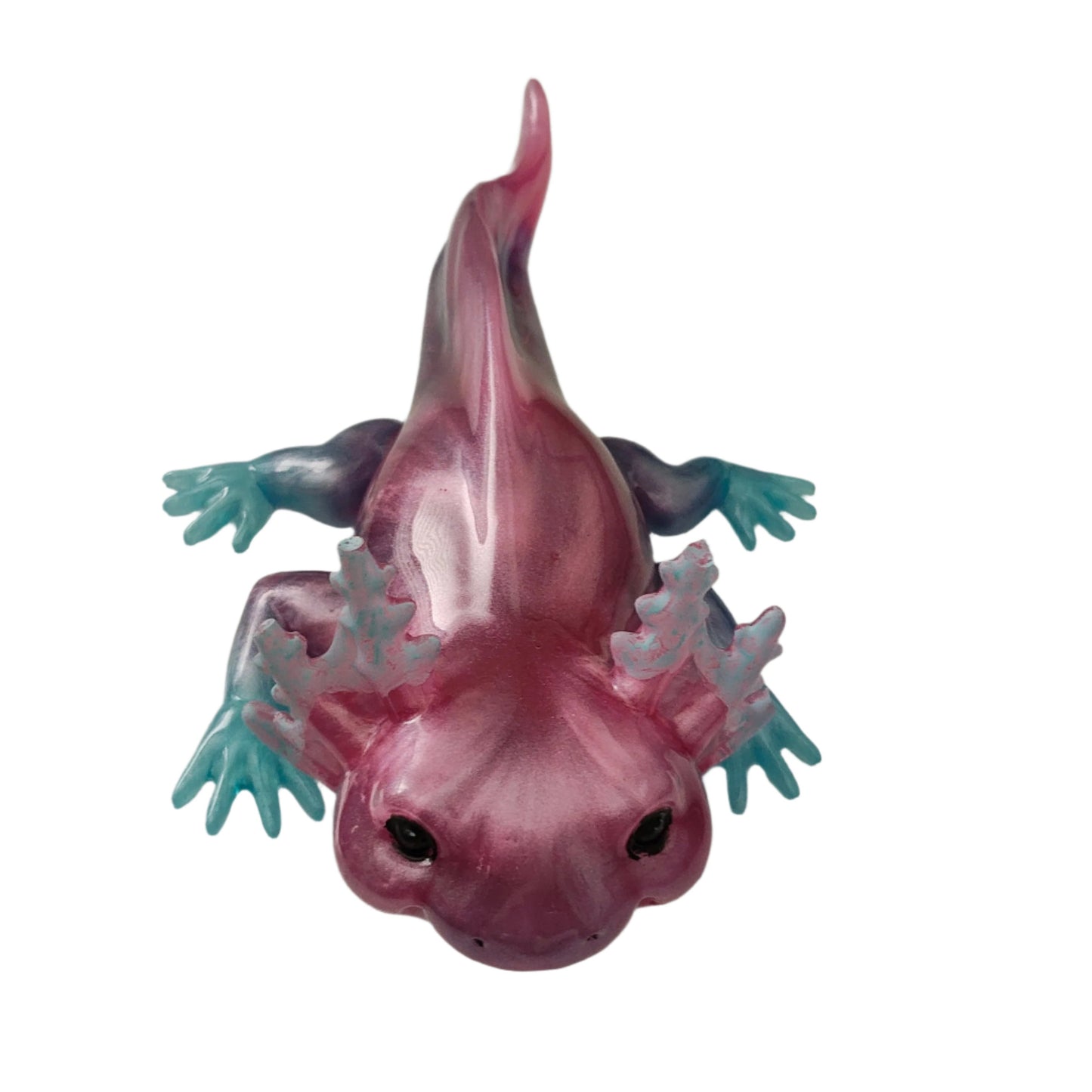 Add a touch of whimsy to your home with our Knickknack - Resin Axolotl! This charming trinket is hand-crafted from resin and features a playful axolotl design. Perfect for adding a pop of personality to any space, it's a must-have for any animal lover.

Knickknack - Resin Axolotl