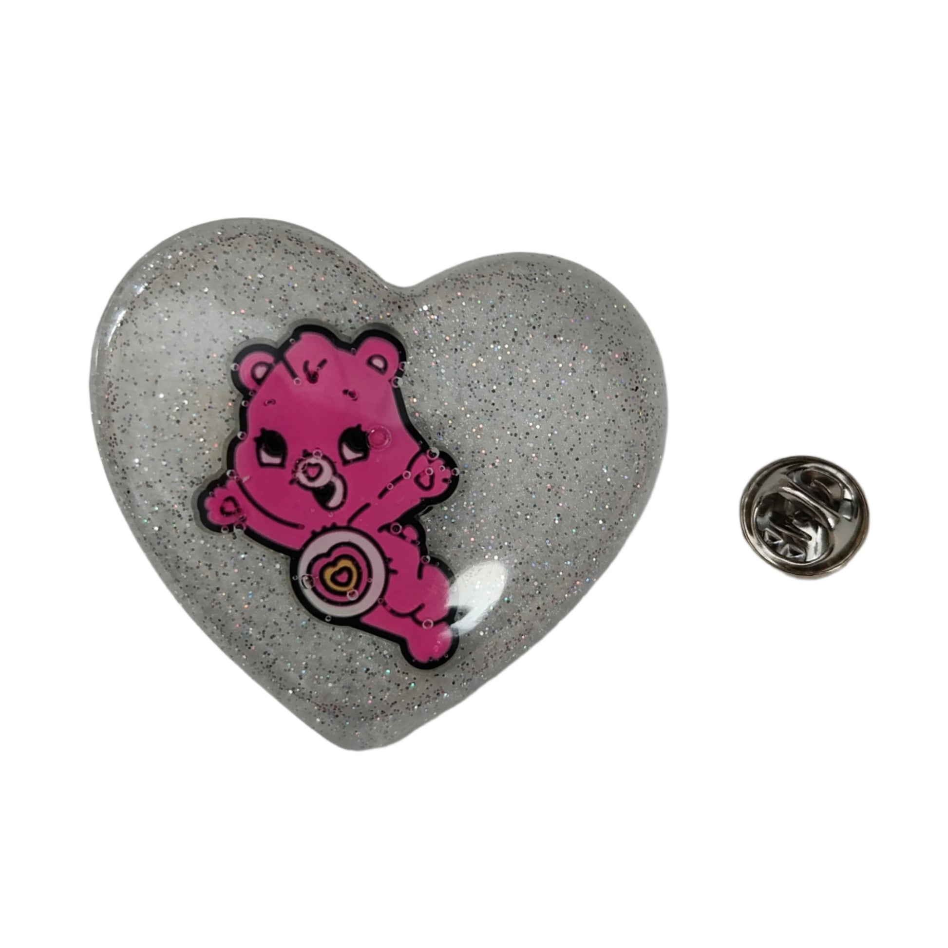 Add a playful touch to your outfit with our 3D care bear resin pin! This quirky accessory features a silver butterfly clutch and is sized at 1.75 x 2 inches, making it the perfect statement piece. Weighing at only 0.40 oz, it won't weigh you down.

Pin - 3D care bear resin pin with silver butterfly clutch