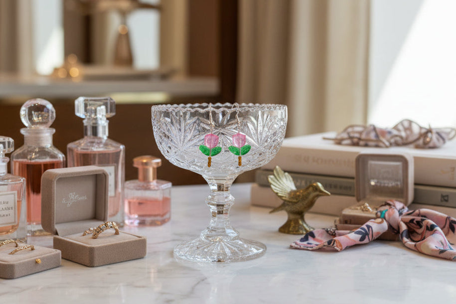 Delicate crystal and seed beads form an enchanting flower design, suspended from hypoallergenic 925 sterling silver hooks. These lightweight earrings measure just 1.5 inches, making them perfect for everyday elegance or layering with other pieces. At only 0.1 oz, they're comfortable enough to wear all day without fatigue. The shimmering bead work catches light beautifully, adding a touch of sparkle and sophistication to any outfit. Ideal for those who appreciate handcrafted jewelry with timeless appeal.