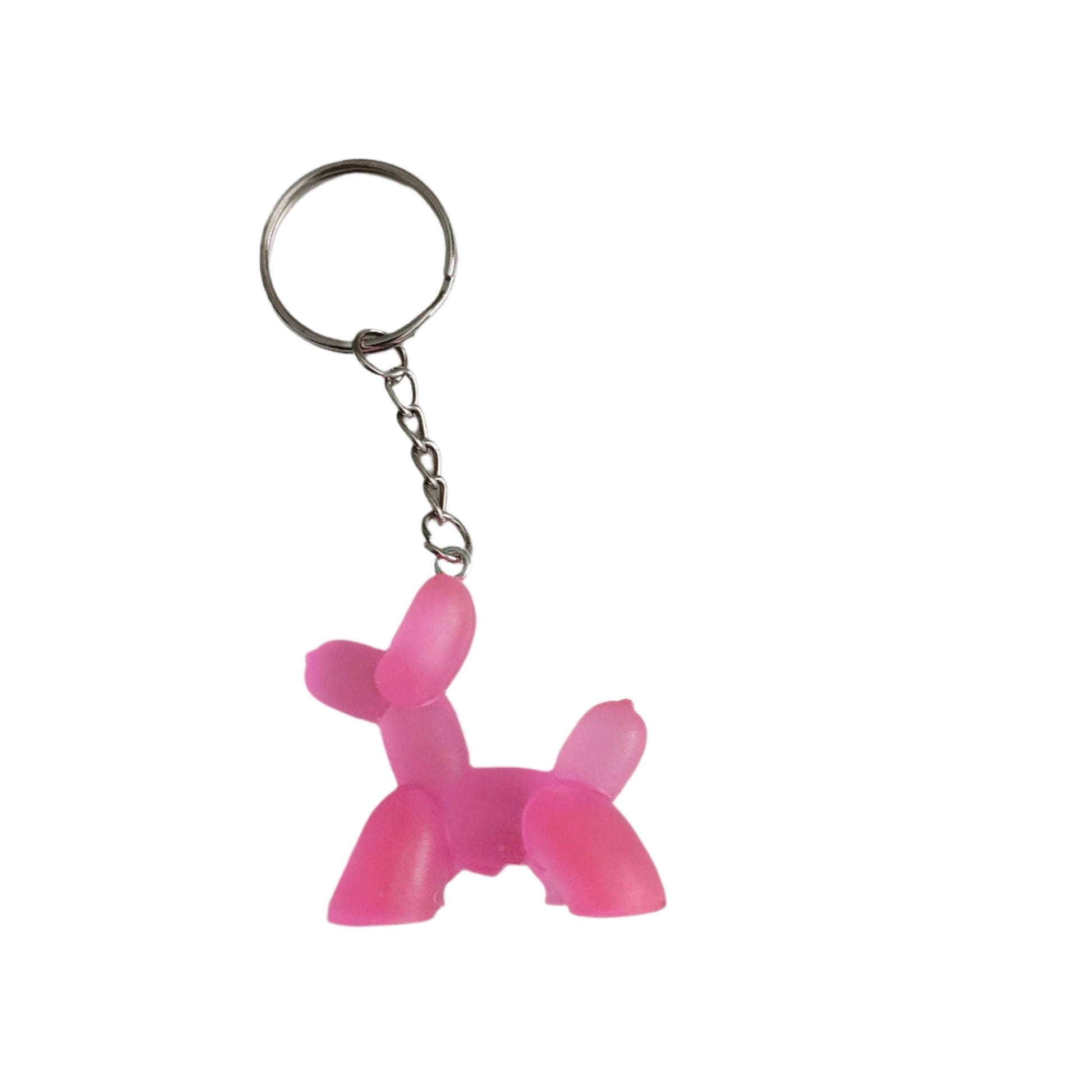 Elevate your style with our Keychain - Resin balloon dog! Made with durable resin, this charming keychain features a playful balloon dog design that's sure to catch everyone's eye. Keep your keys organized and stand out from the crowd with this unique accessory.