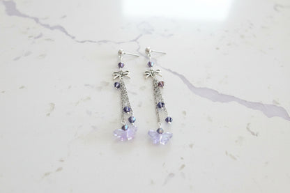 Elevate your everyday style with these enchanting butterfly earrings, featuring delicate silver chains, a charming bow accent, and sparkling crystal beads suspended from classic silver ball post studs. At approximately 3 inches in length, they offer the perfect balance of presence and wearability, making them ideal for both casual outings and special occasions. Weighing just 0.18 oz, these lightweight beauties won't weigh you down, allowing you to wear them comfortably all day long. The intricate design com