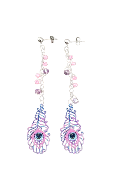 Inspire with our Filigree feather earrings. Made with stainless steel chains and delicate seed beads, these earrings feature intricate filigree feathers on ball post studs. Lightweight and elegant, perfect for any occasion. Elevate your style now!