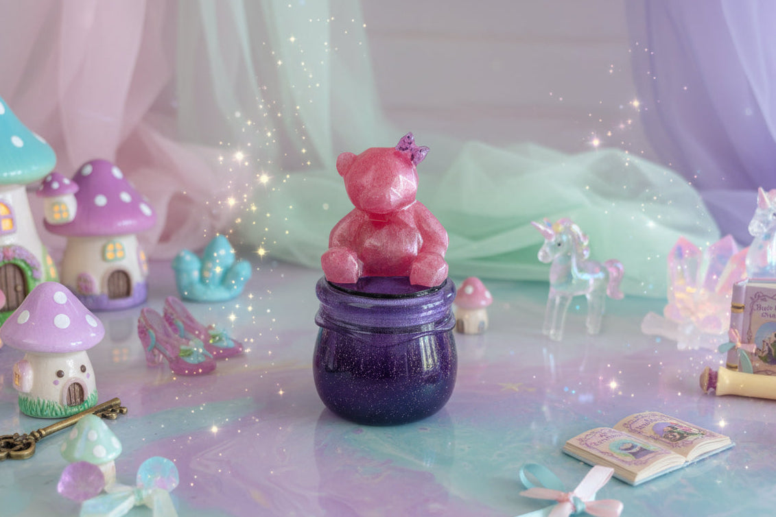 Clear resin jar with bear-shaped screw-on lid