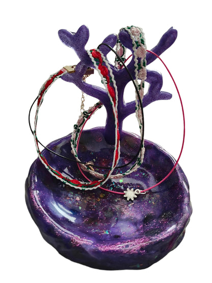 Organize your jewelry with our charming Knickknack - Resin tree jewelry stand. Its 5-inch height and length make it a perfect fit for any dresser or vanity. Plus, its lightweight 10 oz design means you can easily move it around. Keep your trinkets in check with this adorable tree stand!