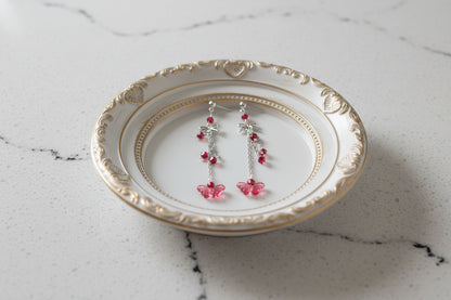 Elevate your everyday style with these enchanting butterfly earrings, featuring delicate silver chains, a charming bow accent, and sparkling crystal beads suspended from classic silver ball post studs. At approximately 3 inches in length, they offer the perfect balance of presence and wearability, making them ideal for both casual outings and special occasions. Weighing just 0.18 oz, these lightweight beauties won't weigh you down, allowing you to wear them comfortably all day long. The intricate design com