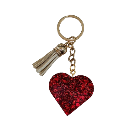 Show your heart is in the right place with this one-of-a-kind keychain! Its resin heart design is as unique as it is eye-catching – no two are alike. Plus, it's lightweight, making it perfect for carrying everywhere you go. Get your keychain on!