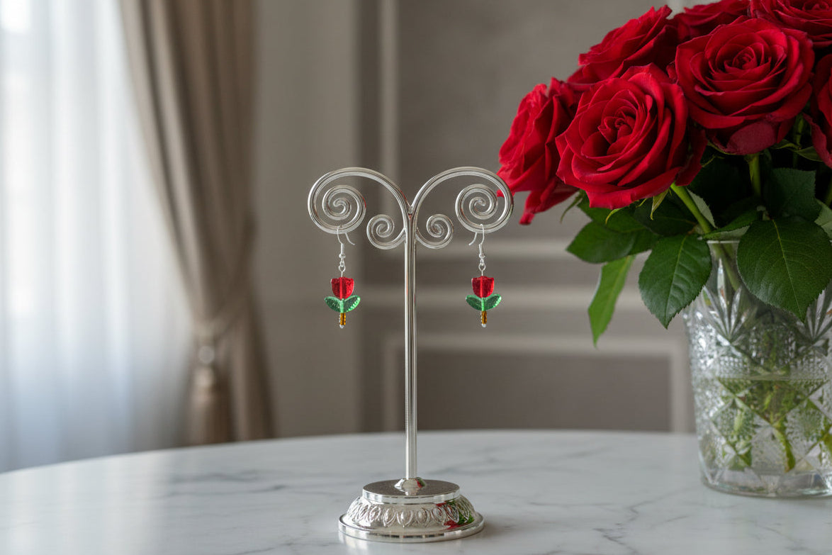 Delicate crystal and seed beads form an enchanting tulip design, suspended from hypoallergenic 925 sterling silver hooks. These lightweight earrings measure just 1.5 inches, making them perfect for everyday elegance or layering with other pieces. At only 0.1 oz, they're comfortable enough to wear all day without fatigue. The shimmering bead work catches light beautifully, adding a touch of sparkle and sophistication to any outfit. Ideal for those who appreciate handcrafted jewelry with timeless appeal.