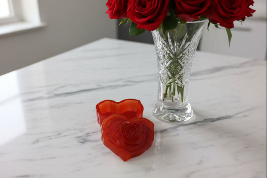 Elevate your space with this Resin Rose Lid Trinket Box, a charming blend of elegance and practicality. Its delicate resin rose lid adds a touch of timeless beauty, while the compact design keeps your small treasures organized and within reach. Perfect for jewelry, keepsakes, or special mementos, this trinket box makes a thoughtful gift or a stylish addition to your own collection. Add a graceful accent to your décor and keep your cherished items safe in style.