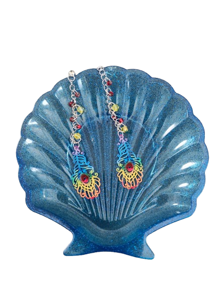 Inspire with our Filigree feather earrings. Made with stainless steel chains and delicate seed beads, these earrings feature intricate filigree feathers on ball post studs. Lightweight and elegant, perfect for any occasion. Elevate your style now!