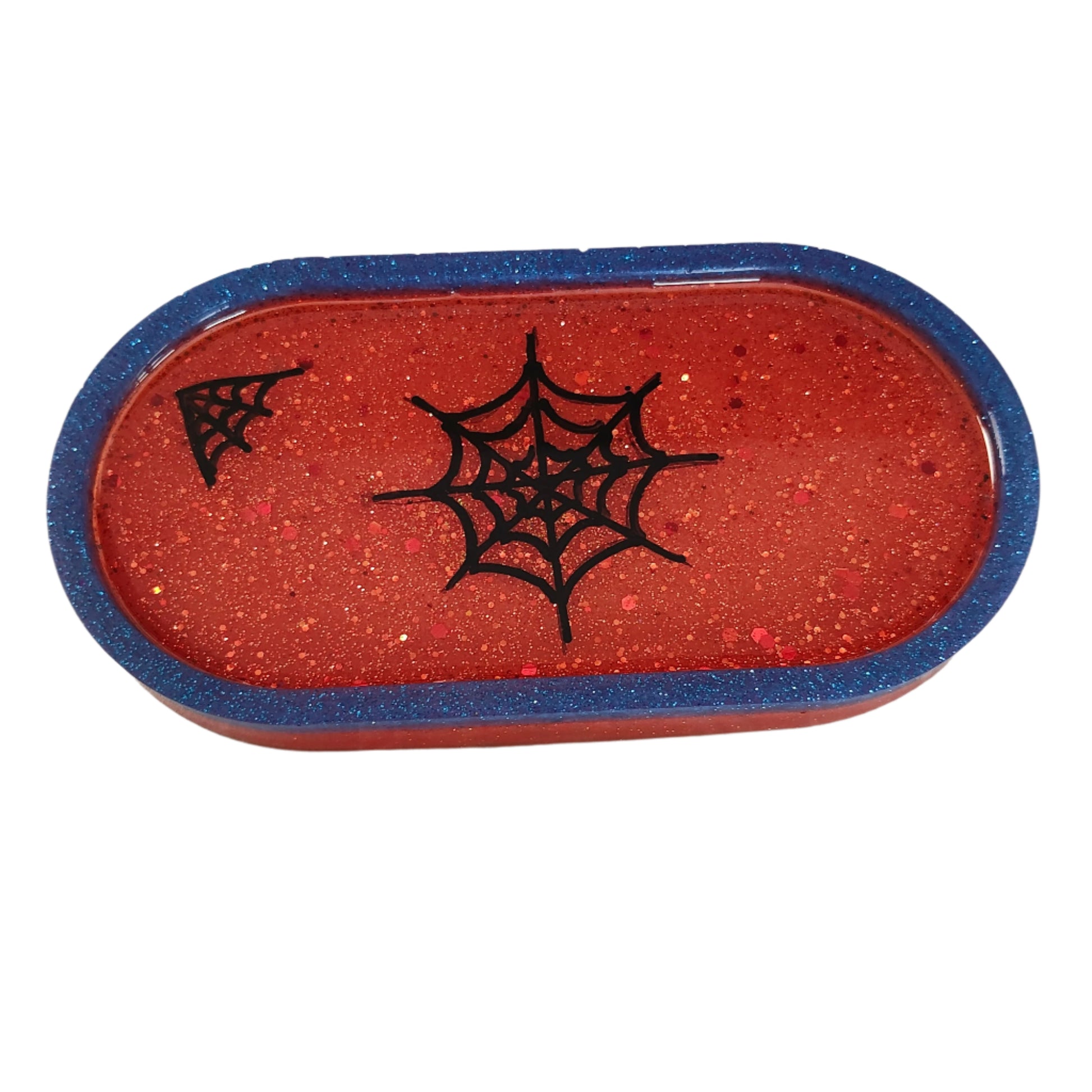 This Knickknack trinket dish not only adds a fun touch to any space with its super hero theme, but also serves as a functional and stylish storage option for small items. Made of durable resin, it is designed to keep jewelry, change, and other trinkets organized and easily accessible.