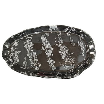 This trinket dish is the perfect way to store and display your favorite trinkets and treasures. The large, wavy oval design adds a unique touch to any space, while the durable resin material ensures long-lasting use. Keep your belongings organized and beautifully showcased with this must-have accessory!