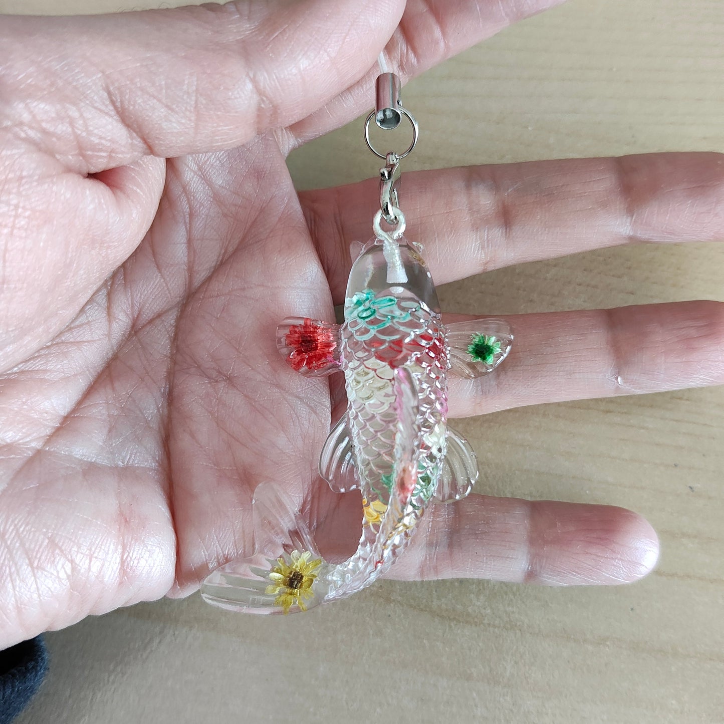 Get hooked on this adorable phone charm - Resin fish! With its playful design and length of 5 inches, it adds a splash of personality to any phone. Perfect for the quirky and fun-loving individual looking for a unique accessory. 

Phone charm - Resin fish

Length is approximately 5 in