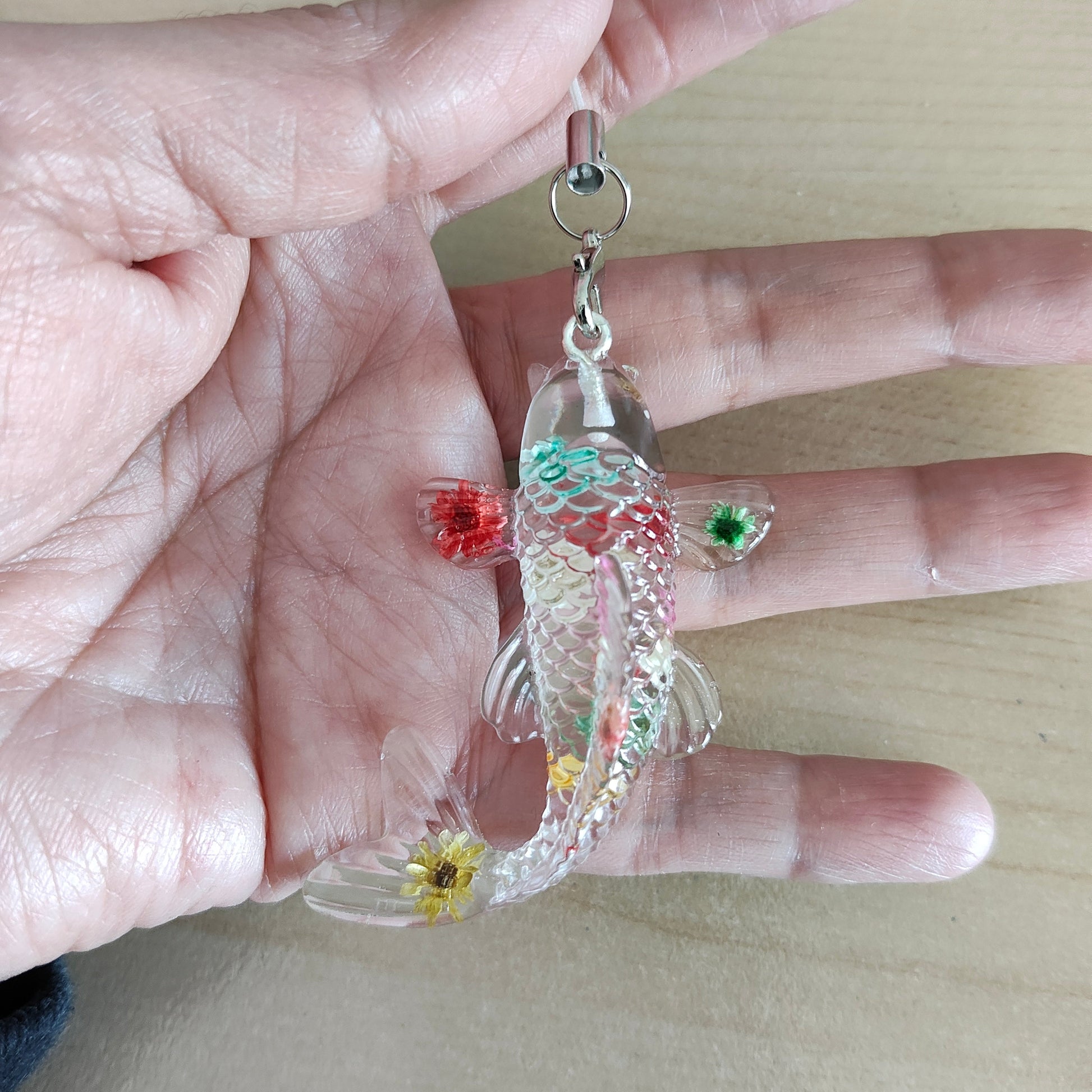 Get hooked on this adorable phone charm - Resin fish! With its playful design and length of 5 inches, it adds a splash of personality to any phone. Perfect for the quirky and fun-loving individual looking for a unique accessory. 

Phone charm - Resin fish

Length is approximately 5 in