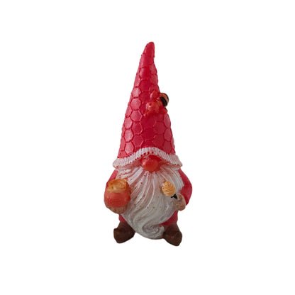 Add a touch of whimsy and charm to your home with our Resin Gnome with honey pot trinket! This endearing gnome figurine is made of durable resin and comes with a sweet little honey pot, perfect for adding a cozy and playful atmosphere to any room. Bring joy to your space with this adorable gnome!