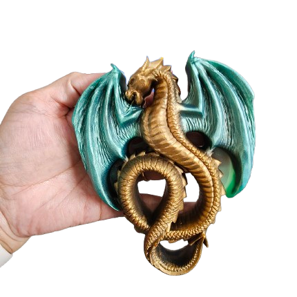 Unleash the magic of this stunning Resin dragon trinket! Perfect for any dragon lover, this handcrafted piece features intricate details and vibrant colors. Whether you display it in your home or give it as a gift, this dragon will surely inspire awe and wonder. Bring this mythical creature to life and add a touch of enchantment to any space.