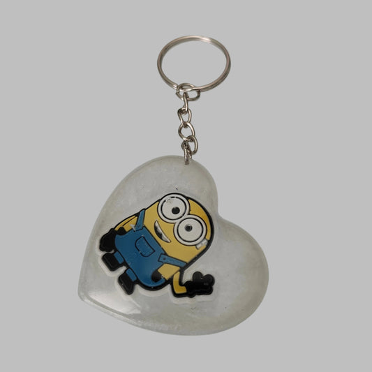Heartwarming and whimsical, our 3D resin minions heart keychain is perfect for any fan of the beloved characters. Durable and compact, it securely holds your keys while adding a touch of fun to your everyday carry. Makes a great gift for yourself or a loved one!