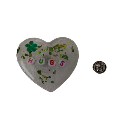 Wear your heart on your sleeve (or anywhere!) with this playful 3D resin heart pin. The silver butterfly clutch adds a touch of whimsy to this lightweight 0.40 oz accessory, measuring 1.75 x 2 in. Show your love with a pinch of quirkiness.