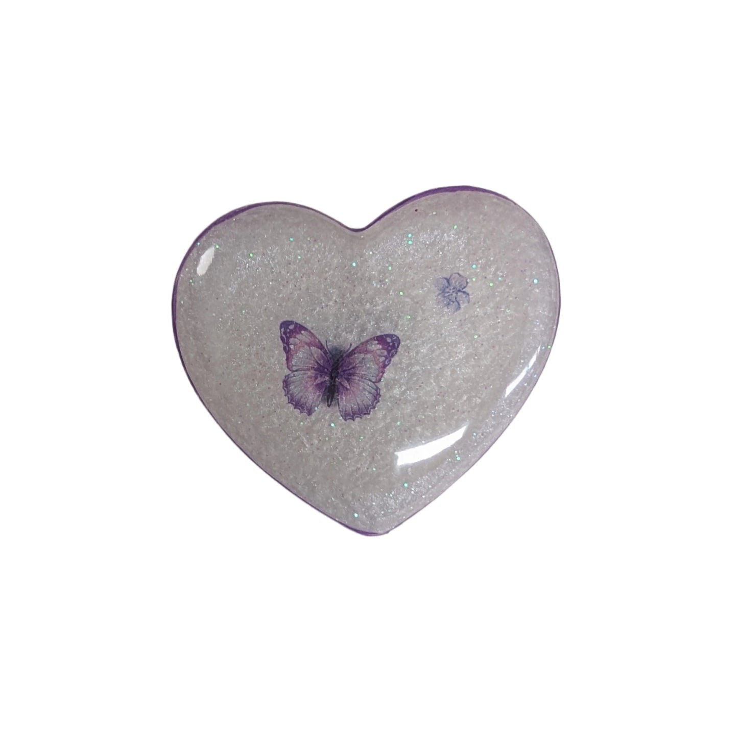 Wear your heart on your sleeve (or anywhere!) with this playful 3D resin heart pin. The silver butterfly clutch adds a touch of whimsy to this lightweight 0.40 oz accessory, measuring 1.75 x 2 in. Show your love with a pinch of quirkiness.

Pin - 3D resin heart pin with silver butterfly clutch
