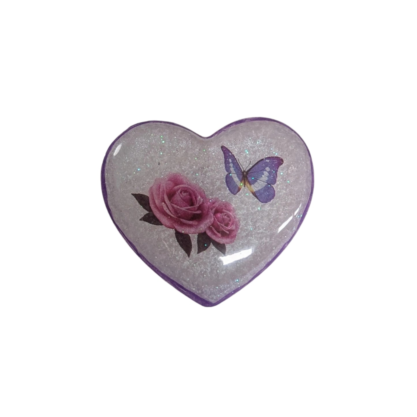 Wear your heart on your sleeve (or anywhere!) with this playful 3D resin heart pin. The silver butterfly clutch adds a touch of whimsy to this lightweight 0.40 oz accessory, measuring 1.75 x 2 in. Show your love with a pinch of quirkiness.

Pin - 3D resin heart pin with silver butterfly clutch