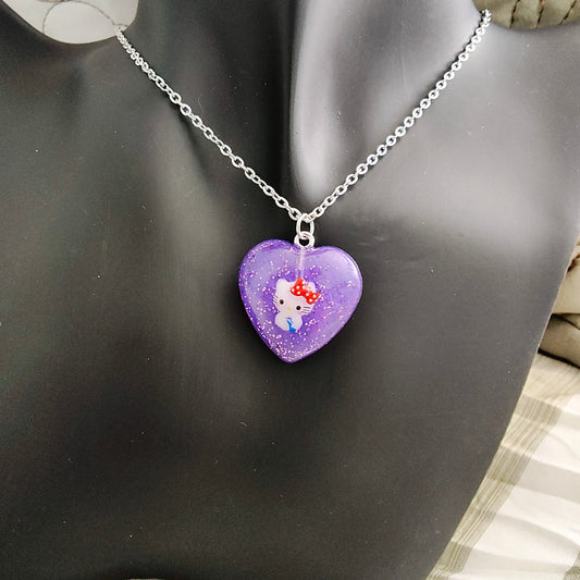 Elevate your accessory game with this stainless steel link cable chain necklace featuring a vibrant hello kitty character pendant. At 18.5 inches, it's the perfect length for everyday wear. Let this charming necklace add a touch of fun to your outfit and showcase your love for this beloved character.