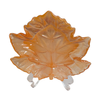 Elevate your space with the Knickknack Resin Maple Leaf Trinket Tray. Crafted with care, its vibrant maple leaf design adds a touch of nature-inspired charm while keeping your small essentials organized. Perfect for keys, jewelry, or coins, this tray combines functionality with seasonal style, making it a must-have accent for any room.
