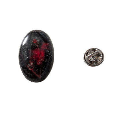 Add a touch of nature to your outfit with our Pin - 3D dried flower resin pin. The intricate design and 3D effect will surely catch everyone's eye. With the sturdy silver butterfly clutch, your pin will stay securely in place. Elevate your style with this unique and beautiful accessory.