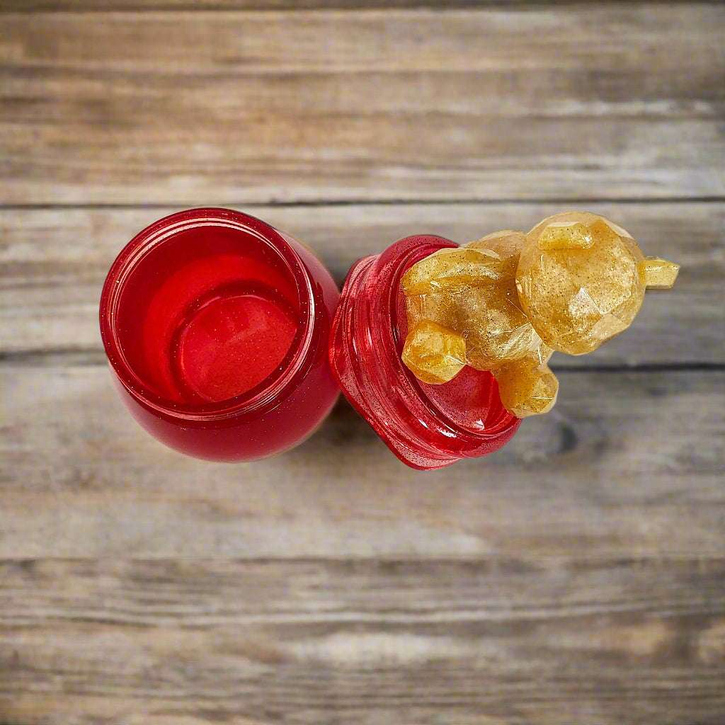 Add a touch of whimsy to your home with our Knickknack - Resin Jar. Featuring a playful bear screw on lid, this jar is perfect for storing small items. Measuring 2.75 x 2.75 inches with a height of 5 inches and a weight of 7.8 oz, it's both functional and fun!

Resin Jar with bear screw on lid