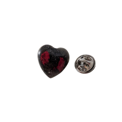 Add a touch of nature to your outfit with our Pin - 3D dried flower resin pin. The intricate design and 3D effect will surely catch everyone's eye. With the sturdy silver butterfly clutch, your pin will stay securely in place. Elevate your style with this unique and beautiful accessory.