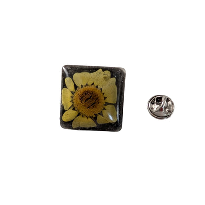 Add a touch of whimsy to any outfit with our 3D dried flower in resin pin. The stunning silver butterfly clutch ensures secure and easy attachment. Let this pin be your new go-to accessory for an elevated and playful look!