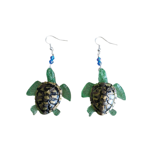 Add a touch of whimsy to your everyday look with our Earrings - Resin turtle on hook. These lightweight earrings feature a charming resin turtle design and a comfortable hook closure, perfect for any occasion. With a length of 2.5 inches and weighing only 0.36 ounces, they're both playful and practical. 