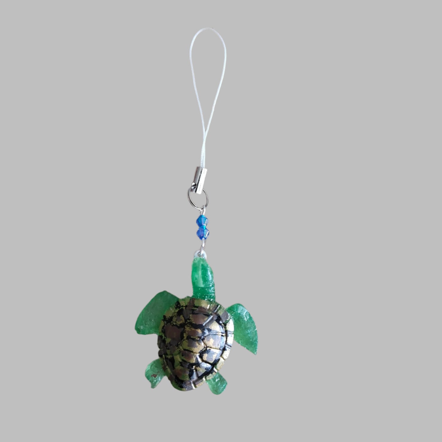Make your phone stand out with this charming resin turtle adorned with colorful beads! At 4.5 inches long, it's a unique way to add personality to your device. Plus, it's lightweight and won't add bulk to your phone. Turtle-y awesome!

Phone charm - Resin turtle with beads

Length is approximately 4.5 in