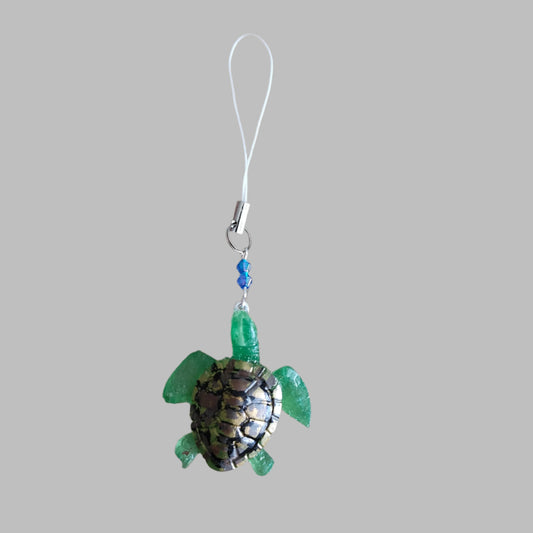 Make your phone stand out with this charming resin turtle adorned with colorful beads! At 4.5 inches long, it's a unique way to add personality to your device. Plus, it's lightweight and won't add bulk to your phone. Turtle-y awesome!

Phone charm - Resin turtle with beads

Length is approximately 4.5 in