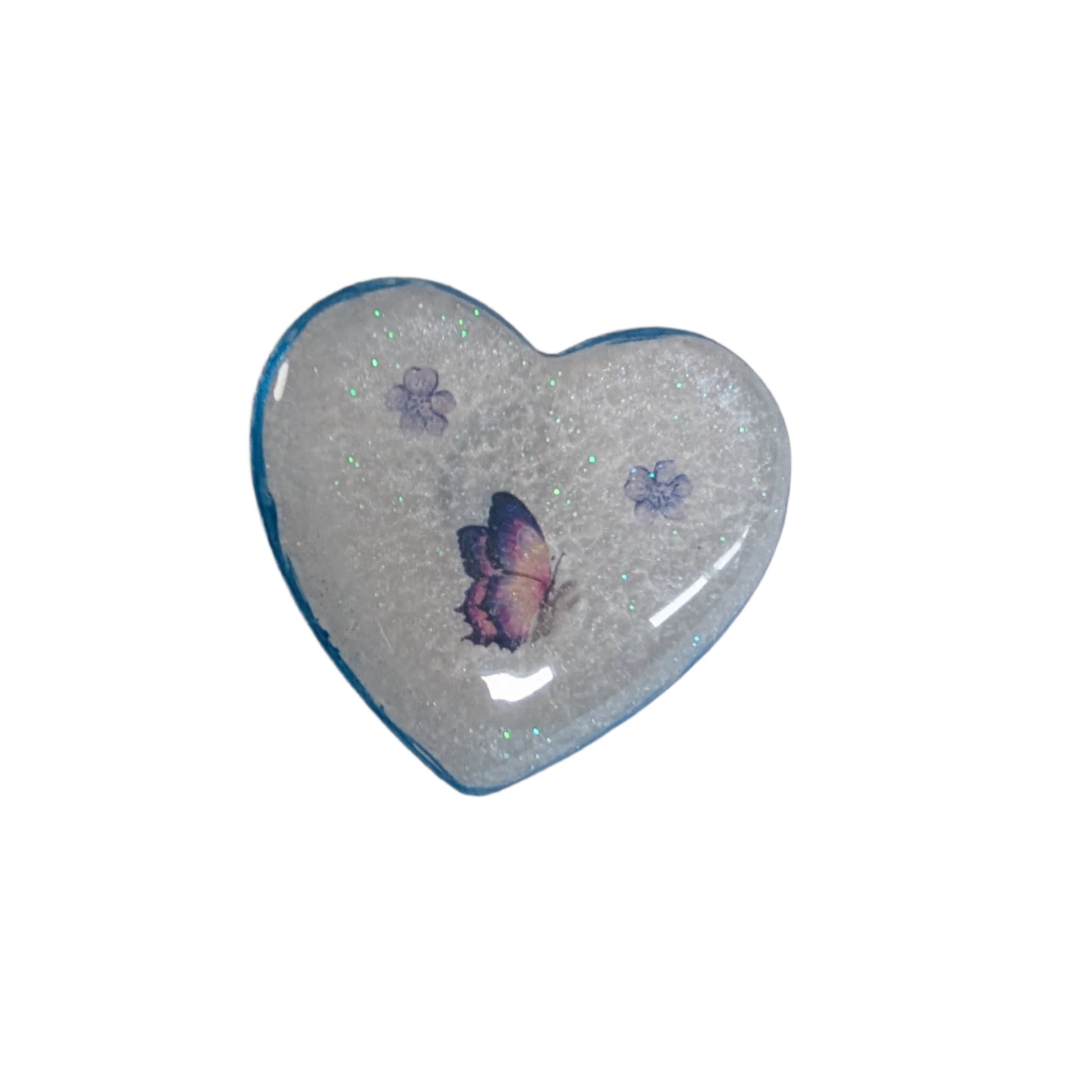 Wear your heart on your sleeve (or anywhere!) with this playful 3D resin heart pin. The silver butterfly clutch adds a touch of whimsy to this lightweight 0.40 oz accessory, measuring 1.75 x 2 in. Show your love with a pinch of quirkiness.

Pin - 3D resin heart pin with silver butterfly clutch