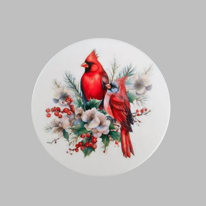 Enhance your home decor with this beautiful coaster featuring a stunning cardinal bird image. Made of durable ceramic, it will protect your surfaces while adding a touch of nature to your space. Perfect for bird lovers and practical for everyday use.