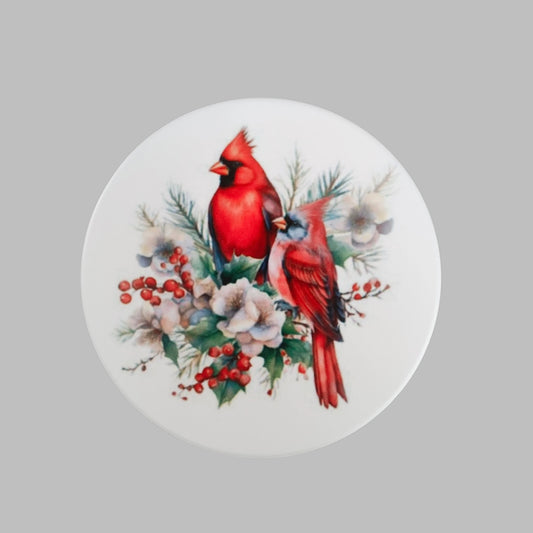 Enhance your home decor with this beautiful coaster featuring a stunning cardinal bird image. Made of durable ceramic, it will protect your surfaces while adding a touch of nature to your space. Perfect for bird lovers and practical for everyday use.