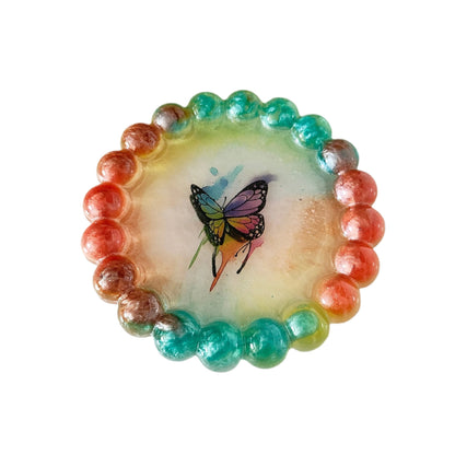 Elevate your home decor with our Round Resin trinket tray! This stylish and functional tray is perfect for storing small items like jewelry, keys, and more. Made of high-quality resin, it adds a touch of sophistication to any room. Organize and display your trinkets in style!