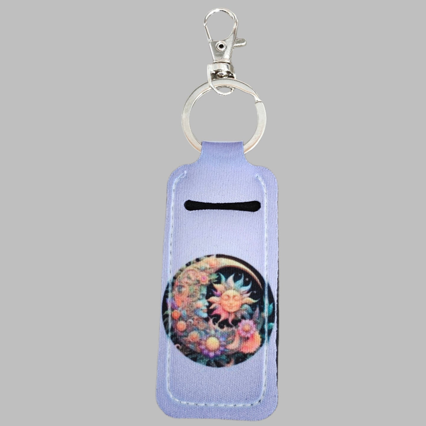 Keep your lipstick accessible anywhere you go with our Keychain - Sublimated Lipstick Holder! Never worry about rummaging through your bag again - this stylish keychain features a beautiful sun and moon image and securely holds your lipstick. Express your love for the cosmos while staying organized.

The lipstick holder keychains are made of sturdy neoprene material, smooth and comfortable to touch, not easy to fade, abrasion resistant and can serve you for a long time.