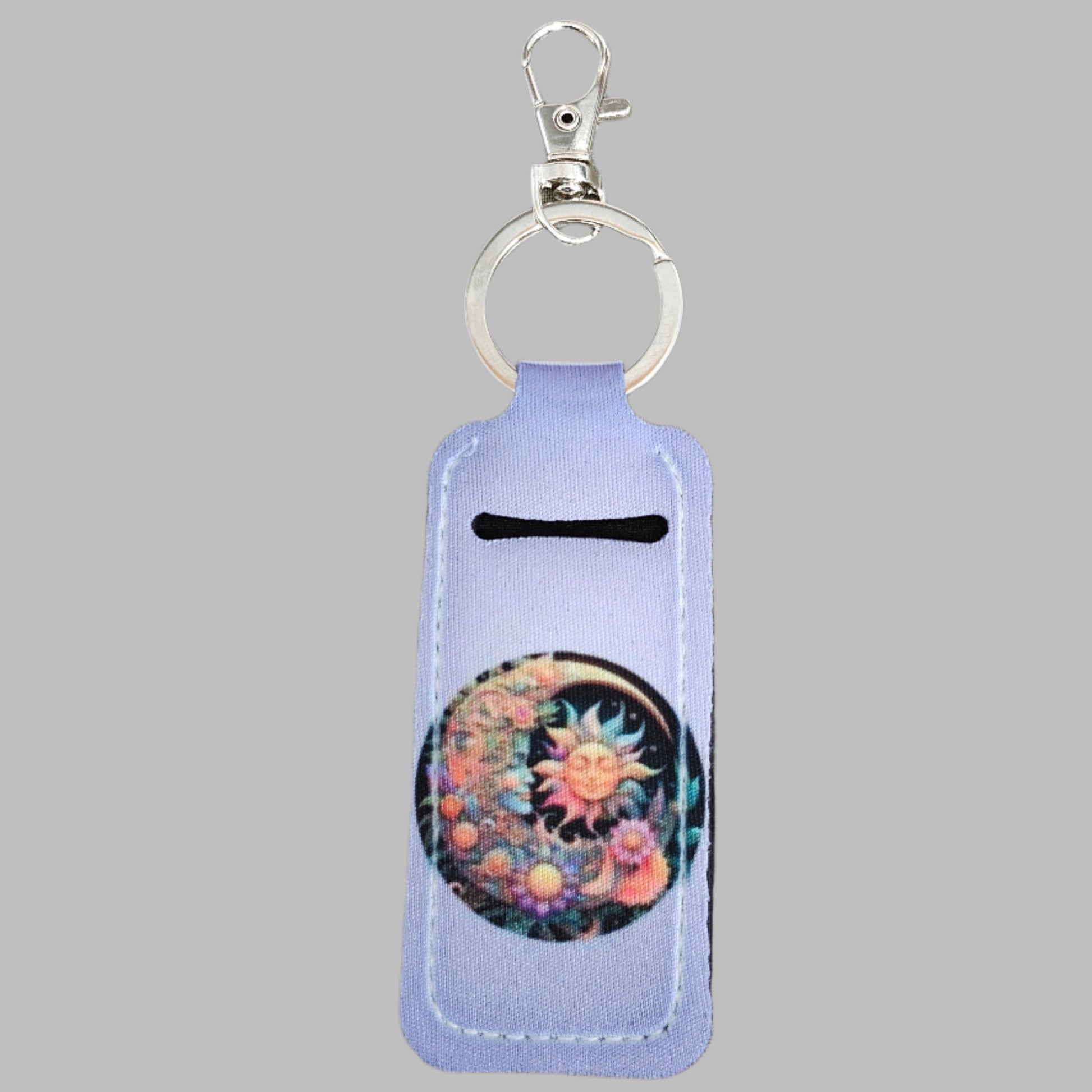 Keep your lipstick accessible anywhere you go with our Keychain - Sublimated Lipstick Holder! Never worry about rummaging through your bag again - this stylish keychain features a beautiful sun and moon image and securely holds your lipstick. Express your love for the cosmos while staying organized.

The lipstick holder keychains are made of sturdy neoprene material, smooth and comfortable to touch, not easy to fade, abrasion resistant and can serve you for a long time.